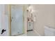 Bright bathroom featuring a glass enclosed shower and vanity with marble top at 904 Rhyolite Ter, Henderson, NV 89011