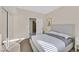 Bedroom with neutral tones, window with blinds and mirrored closets at 904 Rhyolite Ter, Henderson, NV 89011