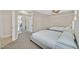 Neutral colored bedroom with 2 beds, and an open view of the house at 904 Rhyolite Ter, Henderson, NV 89011