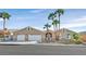 Charming single-story home with a three-car garage and well-maintained landscaping, including palm trees at 904 Rhyolite Ter, Henderson, NV 89011
