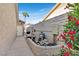Outdoor pool equipment area adjacent to home at 904 Rhyolite Ter, Henderson, NV 89011