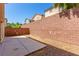 Enclosed backyard featuring a block wall, and concrete patio at 9773 Bedstraw St, Las Vegas, NV 89178