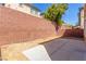 Enclosed backyard featuring a block wall, and concrete patio at 9773 Bedstraw St, Las Vegas, NV 89178