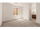 Bedroom boasts neutral paint, carpeting, and natural light at 9773 Bedstraw St, Las Vegas, NV 89178