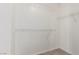 Walk-in closet with carpet and adjustable wire shelving for storage at 9773 Bedstraw St, Las Vegas, NV 89178