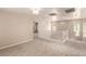 Spacious loft area with neutral paint, carpeting, natural light, and railings at 9773 Bedstraw St, Las Vegas, NV 89178