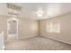 Spacious loft area with neutral paint, carpeting, and natural light at 9773 Bedstraw St, Las Vegas, NV 89178