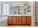 Bathroom boasts double sinks, vanity with modern lighting, and a separate water closet that create an inviting atmosphere at 9812 Turtle Walk Ave, Las Vegas, NV 89149