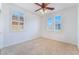 Bedroom features carpeted flooring and plantation shutters with natural light enhancing its comfort and appeal at 9812 Turtle Walk Ave, Las Vegas, NV 89149