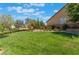 Expansive community park featuring a well-maintained lawn and a variety of shrubs and trees at 9812 Turtle Walk Ave, Las Vegas, NV 89149