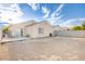 Spacious backyard featuring desert landscaping and a block wall for added privacy at , Las Vegas, NV 89130