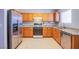 Kitchen with granite countertops, stainless steel appliances, and ample wooden cabinetry at , Las Vegas, NV 89130
