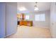 Bright eat-in kitchen showcasing wooden cabinets, tile floors, and stainless steel appliances at , Las Vegas, NV 89130
