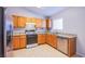 Updated kitchen with granite counters, wood cabinets and stainless steel appliances at , Las Vegas, NV 89130