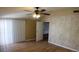 Spacious bedroom with lots of natural light, ceiling fan, and hardwood flooring at 10 E Bonanza Rd, Las Vegas, NV 89101
