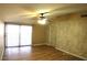 Bright bedroom with hardwood flooring and light filtering window treatments at 10 E Bonanza Rd, Las Vegas, NV 89101