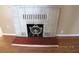 Close-up of white brick fireplace with decorative firebox cover at 10 E Bonanza Rd, Las Vegas, NV 89101