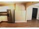 Kitchen featuring stainless appliances, wood floors, and tile backsplash at 10 E Bonanza Rd, Las Vegas, NV 89101