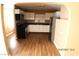 Modern kitchen with stainless steel appliances and white cabinetry at 10 E Bonanza Rd, Las Vegas, NV 89101