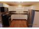 Kitchen featuring stainless steel appliances and white cabinets at 10 E Bonanza Rd, Las Vegas, NV 89101
