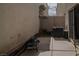Backyard patio with a grill and air conditioner at 10049 Fragile Fields St, Las Vegas, NV 89183