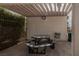 Relax in the shaded community picnic area with a table and grill, perfect for outdoor dining and gatherings at 10049 Fragile Fields St, Las Vegas, NV 89183