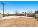 Spacious backyard ready for landscaping and customization with perimeter fence at 1020 Baker Ave, Las Vegas, NV 89108