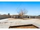 Large backyard featuring a big concrete area and mature shade tree at 1020 Baker Ave, Las Vegas, NV 89108