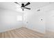 Bright bedroom with ceiling fan, neutral paint, and modern flooring at 1020 Baker Ave, Las Vegas, NV 89108