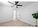 Bedroom featuring ceiling fan, neutral walls, and wood-style floors at 1020 Baker Ave, Las Vegas, NV 89108