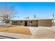 Well-kept single-story home featuring desert landscaping and a concrete driveway at 1020 Baker Ave, Las Vegas, NV 89108