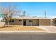 Well-maintained single-story home with desert landscaping and ample parking space at 1020 Baker Ave, Las Vegas, NV 89108