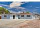 Charming single-story home featuring a spacious driveway and beautiful desert landscaping at 108 Prince Ln, Las Vegas, NV 89110