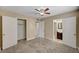 The main bedroom has plush carpets, natural light, and ensuite bathroom access at 108 Prince Ln, Las Vegas, NV 89110