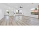 Bright and spacious living room with stylish flooring, recessed lights and large windows at 116 Crescent Bay St, Henderson, NV 89012