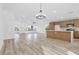 Light-filled living space offering modern finishes, recessed lighting, and seamless flow to kitchen at 116 Crescent Bay St, Henderson, NV 89012