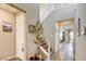 Bright foyer with two-story ceilings, wood floors, and a staircase at 12355 Grey Dunes Ave, Las Vegas, NV 89138