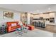 Spacious living room showcasing seamless integration with the modern kitchen at 12355 Grey Dunes Ave, Las Vegas, NV 89138