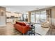 Open-concept living area flowing to the dining and modern kitchen at 12355 Grey Dunes Ave, Las Vegas, NV 89138