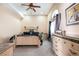 Spacious bedroom features a ceiling fan, large windows, and carpeted floors at 1259 N Hollywood Blvd, Las Vegas, NV 89110