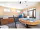 Entertaining game room with a poker table and jacuzzi at 1259 N Hollywood Blvd, Las Vegas, NV 89110