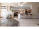 Bright open floor plan with bar top, neutral color palette, and dark accent flooring at 1259 N Hollywood Blvd, Las Vegas, NV 89110