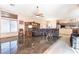 Open concept living room and kitchen with tile flooring and recessed lighting at 1259 N Hollywood Blvd, Las Vegas, NV 89110