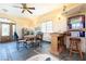 Sunroom features a dining table and built-in bar with seating at 1259 N Hollywood Blvd, Las Vegas, NV 89110