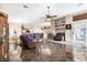 Spacious living room featuring tile floors, a ceiling fan, and access to a dining area at 1259 N Hollywood Blvd, Las Vegas, NV 89110