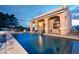 Backyard view of an inviting pool and covered patio at 1259 N Hollywood Blvd, Las Vegas, NV 89110