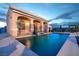 Inviting backyard with a pool and stunning water feature at 1259 N Hollywood Blvd, Las Vegas, NV 89110
