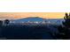 Panoramic city skyline view from rooftop showcases vibrant city lights at sunset at 1259 N Hollywood Blvd, Las Vegas, NV 89110