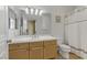 Well-lit bathroom featuring a single sink vanity and a shower-tub combination at 1272 Olivia Pkwy, Henderson, NV 89011