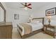 Cozy bedroom with neutral tones, a comfortable bed, and stylish decor at 1272 Olivia Pkwy, Henderson, NV 89011